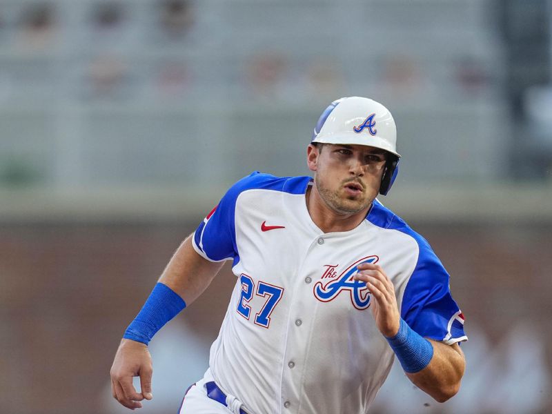 Jul 29, 2023; Cumberland, Georgia, USA; Atlanta Braves third baseman Austin Riley (27) runs the bases against the Milwaukee Brewers during the first inning at Truist Park. Mandatory Credit: Dale Zanine-USA TODAY Sports