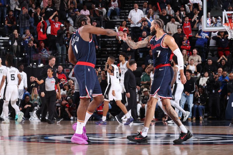 INGLEWOOD, CA - NOVEMBER 4: James Harden #1 and Amir Coffey #7 of the LA Clippers high five during the game against the San Antonio Spurs on November 4, 2024 at Intuit Dome in Los Angeles, California. NOTE TO USER: User expressly acknowledges and agrees that, by downloading and/or using this Photograph, user is consenting to the terms and conditions of the Getty Images License Agreement. Mandatory Copyright Notice: Copyright 2024 NBAE (Photo by Nathaniel S. Butler/NBAE via Getty Images)