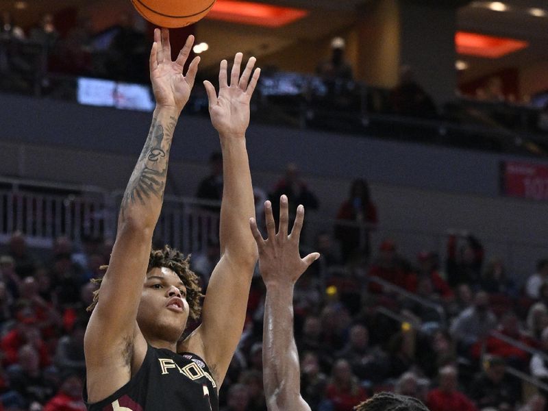 Feb 4, 2023; Louisville, Kentucky, USA;  Florida State Seminoles forward Cam Corhen (3) shoots against Louisville Cardinals forward Roosevelt Wheeler (4) during the first half at KFC Yum! Center. Florida State defeated Louisville 81-78. Mandatory Credit: Jamie Rhodes-USA TODAY Sports