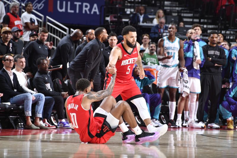 HOUSTON, TX - OCTOBER 23: Fred VanVleet #5 helps up Jabari Smith Jr. #10 of the Houston Rockets against the Charlotte Hornets  during a regular season game on October 23, 2024 at the Toyota Center in Houston, Texas. NOTE TO USER: User expressly acknowledges and agrees that, by downloading and or using this photograph, User is consenting to the terms and conditions of the Getty Images License Agreement. Mandatory Copyright Notice: Copyright 2024 NBAE (Photo by Logan Riely/NBAE via Getty Images)