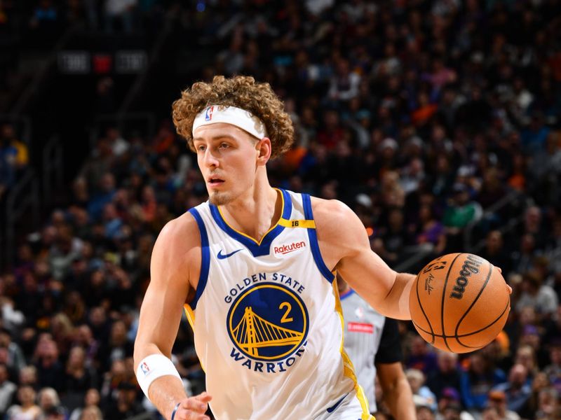 PHOENIX, AZ - NOVEMBER 30: Brandin Podziemski #2 of the Golden State Warriors dribbles the ball during the game against the Phoenix Suns on November 30, 2024 at Footprint Center in Phoenix, Arizona. NOTE TO USER: User expressly acknowledges and agrees that, by downloading and or using this photograph, user is consenting to the terms and conditions of the Getty Images License Agreement. Mandatory Copyright Notice: Copyright 2024 NBAE (Photo by Barry Gossage/NBAE via Getty Images)