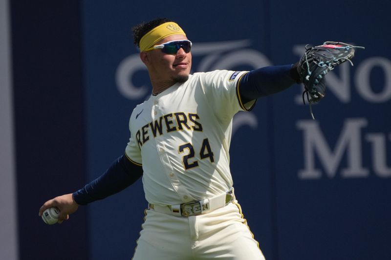 Mar 16, 2025; Phoenix, Arizona, USA; Milwaukee Brewers catcher William Contreras (24) gets ready for a game against the Cleveland Guardians at American Family Fields of Phoenix. Mandatory Credit: Rick Scuteri-Imagn Images