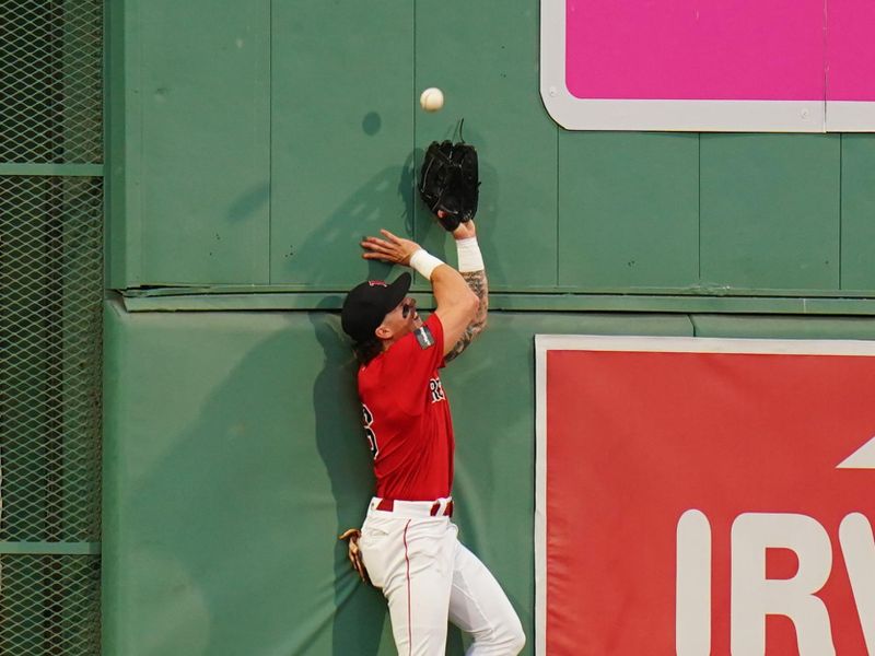 Jun 1, 2023; Boston, Massachusetts, USA; Boston Red Sox center fielder Jarren Duran (16) misses the catch against the Cincinnati Reds in the fourth inning at Fenway Park. Mandatory Credit: David Butler II-USA TODAY Sports