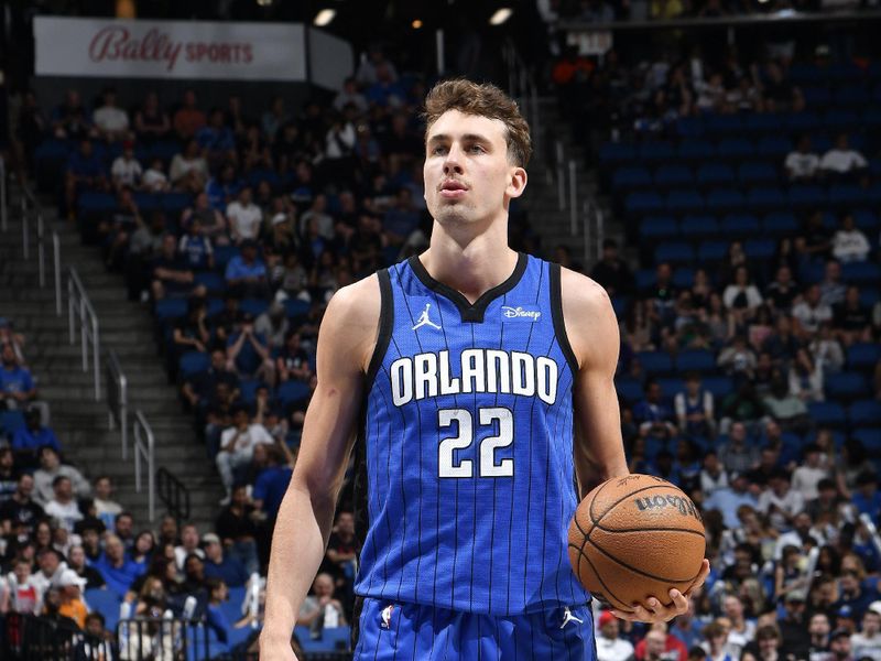 ORLANDO, FL - APRIL 1: Franz Wagner #22 of the Orlando Magic shoots a free throw during the game against the Portland Trail Blazers on April 1, 2024 at Kia Center in Orlando, Florida. NOTE TO USER: User expressly acknowledges and agrees that, by downloading and or using this photograph, User is consenting to the terms and conditions of the Getty Images License Agreement. Mandatory Copyright Notice: Copyright 2024 NBAE (Photo by Fernando Medina/NBAE via Getty Images)