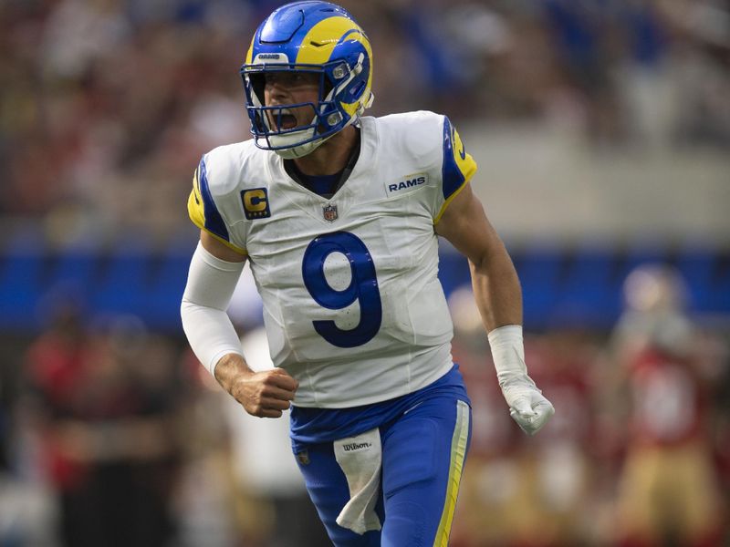 Los Angeles Rams quarterback Matthew Stafford (9) celebrates the team's touchdown during an NFL football game against the San Francisco 49ers, Sunday, Sept. 22, 2024, in Inglewood, Calif. (AP Photo/Kyusung Gong)