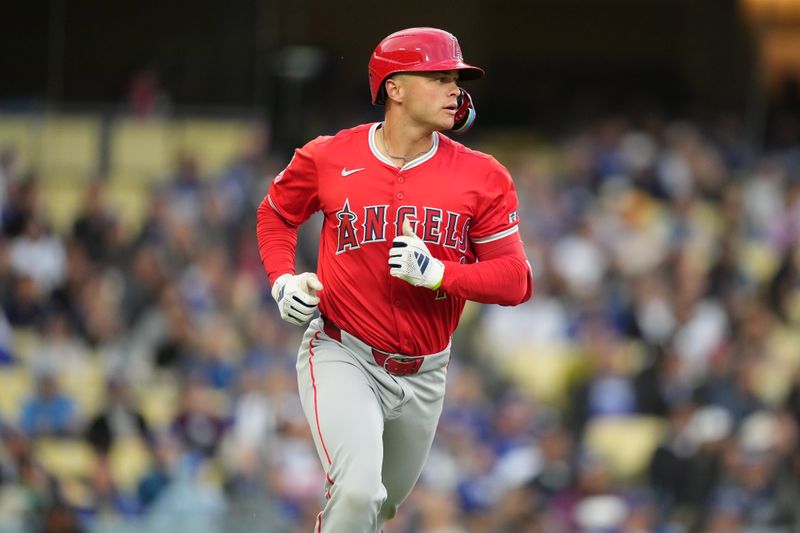 Mar 25, 2024; Los Angeles, California, USA; Los Angeles Angels catcher Logan O'Hoppe (14) runs the bases after hitting a three-run home run in the second inning against the Los Angeles Dodgers at Dodger Stadium. Mandatory Credit: Kirby Lee-USA TODAY Sports