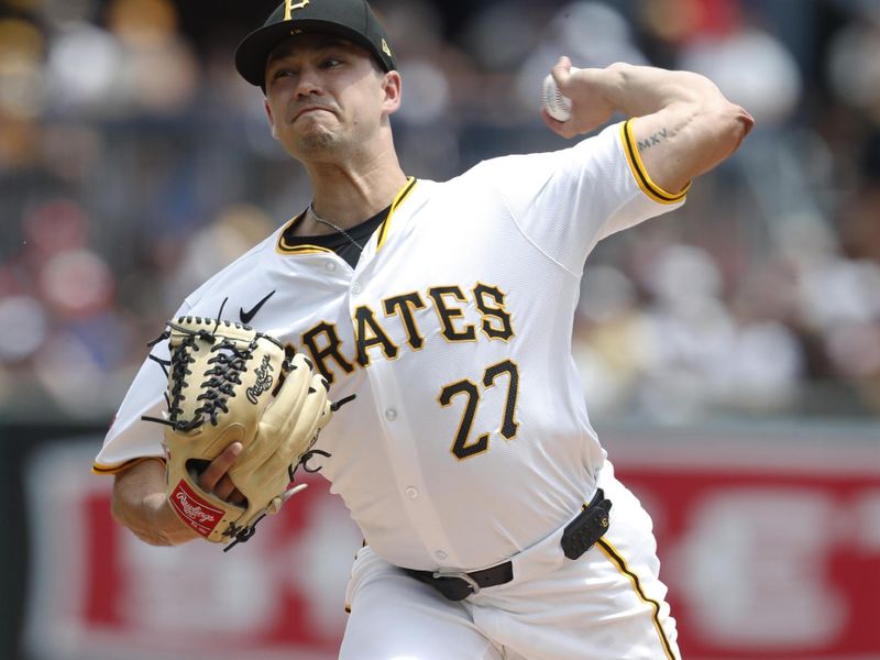 Jul 21, 2024; Pittsburgh, Pennsylvania, USA;  Pittsburgh Pirates starting pitcher Marco Gonzales (27) delivers a pitch against the Philadelphia Phillies during the first inning at PNC Park. Mandatory Credit: Charles LeClaire-USA TODAY Sports