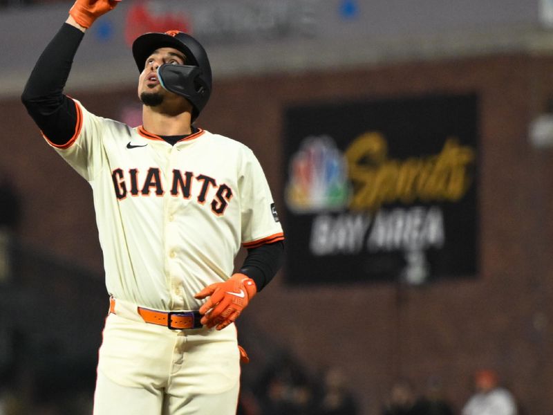 May 1, 2025; San Francisco, California, USA; San Francisco Giants shortstop Willy Adames (2) celebrates his single against the Colorado Rockies in the sixth inning at Oracle Park. Mandatory Credit: Eakin Howard-Imagn Images