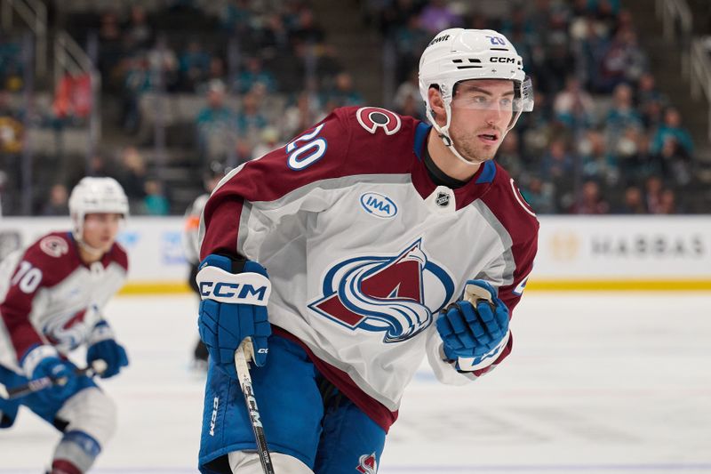 Oct 20, 2024; San Jose, California, USA; Colorado Avalanche center Ross Colton (20) skates on the ice against the San Jose Sharks during the third period at SAP Center at San Jose. Mandatory Credit: Robert Edwards-Imagn Images