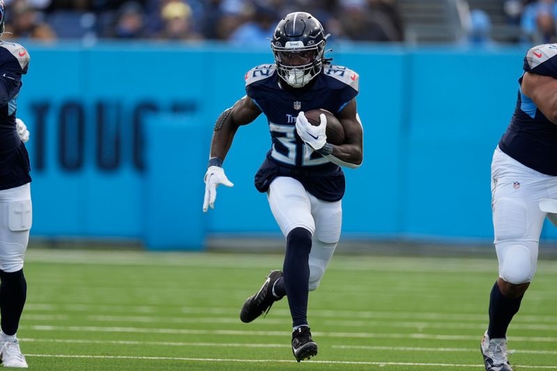 Tennessee Titans running back Tyjae Spears (32) runs the ball during the first half of an NFL football game against the Jacksonville Jaguars, Sunday, Jan. 7, 2024, in Nashville, Tenn. (AP Photo/George Walker IV)