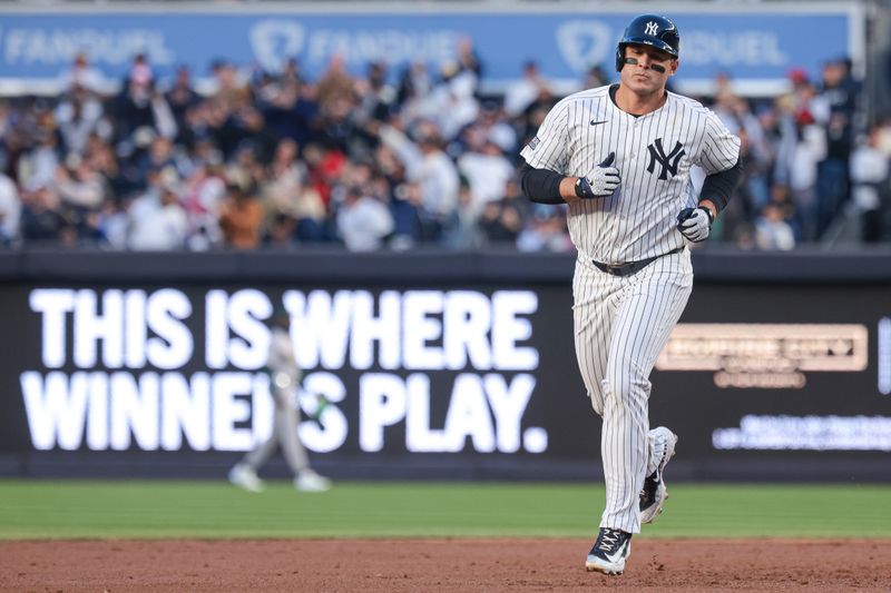 Apr 23, 2024; Bronx, New York, USA; New York Yankees first baseman Anthony Rizzo (48) rounds the bases after hitting a two-run home run during the first inning against the Oakland Athletics at Yankee Stadium. Mandatory Credit: Vincent Carchietta-USA TODAY Sports