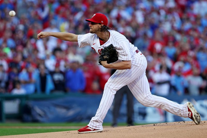 Oct 23, 2023; Philadelphia, Pennsylvania, USA; Philadelphia Phillies starting pitcher Aaron Nola (27) pitches during the first inning against the Arizona Diamondbacks in game six of the NLCS for the 2023 MLB playoffs at Citizens Bank Park. Mandatory Credit: Bill Streicher-USA TODAY Sports