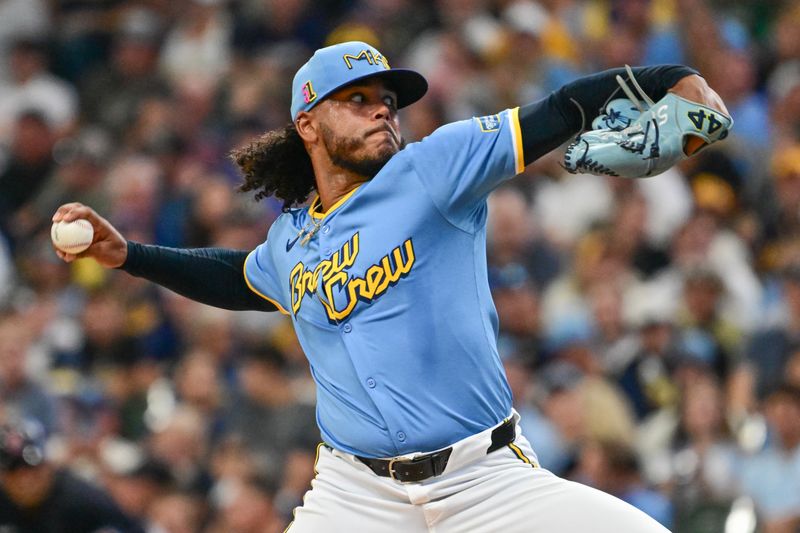 Aug 17, 2024; Milwaukee, Wisconsin, USA; Milwaukee Brewers starting pitcher Freddy Peralta (51) pitches against the Cleveland Guardians in the first inning at American Family Field. Mandatory Credit: Benny Sieu-USA TODAY Sports