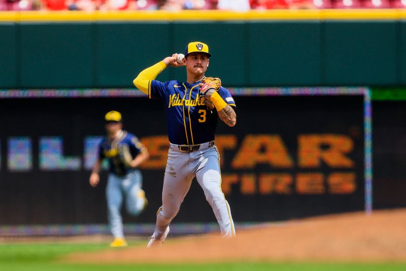 Jun 4, 2025; Cincinnati, Ohio, USA; Milwaukee Brewers shortstop Joey Ortiz (3) throws to first to get Cincinnati Reds designated hitter Tyler Stephenson (not pictured) out in the eighth inning at Great American Ball Park. Mandatory Credit: Katie Stratman-Imagn Images