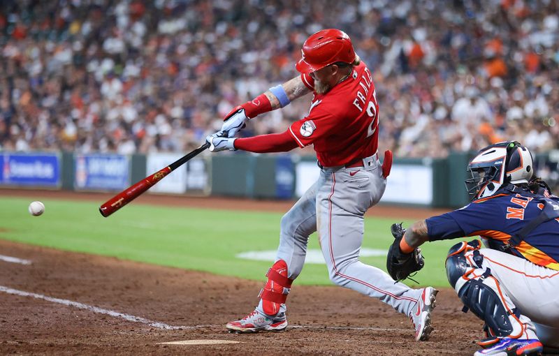 Jun 18, 2023; Houston, Texas, USA; Cincinnati Reds left fielder Jake Fraley (27) bats during the sixth inning against the Houston Astros at Minute Maid Park. Mandatory Credit: Troy Taormina-USA TODAY Sports