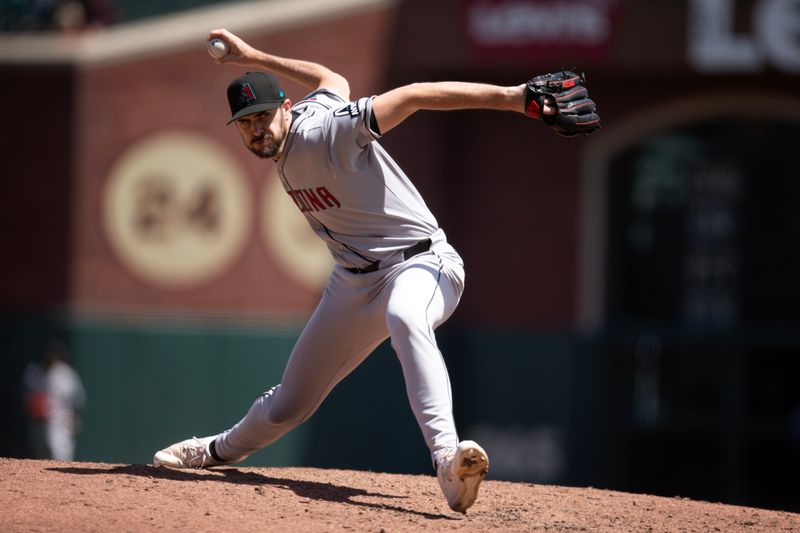 May 14, 2025; San Francisco, California, USA; Arizona Diamondbacks pitcher Ryan Thompson (81) delivers a pitch against the San Francisco Giants during the fifth inning at Oracle Park. Mandatory Credit: D. Ross Cameron-Imagn Images