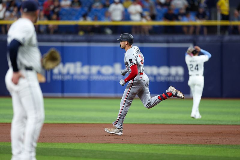 Sep 2, 2024; St. Petersburg, Florida, USA; -Minnesota Twins outfielder Trevor Larnach (9) runs the bases after hitting a three-run home run against the Tampa Bay Rays in the second inning at Tropicana Field. Mandatory Credit: Nathan Ray Seebeck-USA TODAY Sports