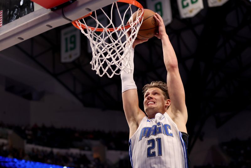 DALLAS, TEXAS - JANUARY 29: Moritz Wagner #21 of the Orlando Magic dunks the ball against the Dallas Mavericks in the first half at American Airlines Center on January 29, 2024 in Dallas, Texas. NOTE TO USER: User expressly acknowledges and agrees that, by downloading and or using this photograph, User is consenting to the terms and conditions of the Getty Images License Agreement. (Photo by Tim Heitman/Getty Images)