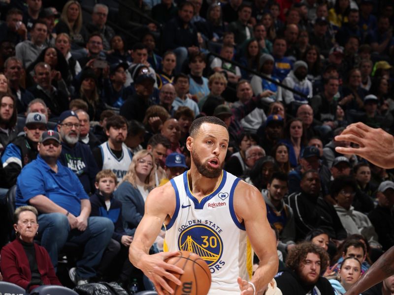 MINNEAPOLIS, MN -  MARCH 24: Stephen Curry #30 of the Golden State Warriors drives to the basket during the game against the Minnesota Timberwolves on March 24, 2024 at Target Center in Minneapolis, Minnesota. NOTE TO USER: User expressly acknowledges and agrees that, by downloading and or using this Photograph, user is consenting to the terms and conditions of the Getty Images License Agreement. Mandatory Copyright Notice: Copyright 2024 NBAE (Photo by David Sherman/NBAE via Getty Images)