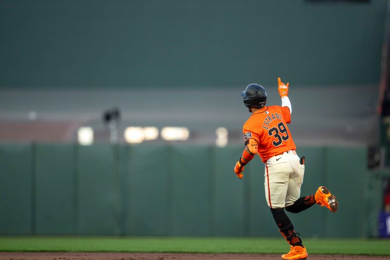 May 10, 2024; San Francisco, California, USA; San Francisco Giants second baseman Thairo Estrada (39) celebrates as he rounds the base after hitting a solo home run against the Cincinnati Reds during the first inning at Oracle Park. Mandatory Credit: Neville E. Guard-USA TODAY Sports