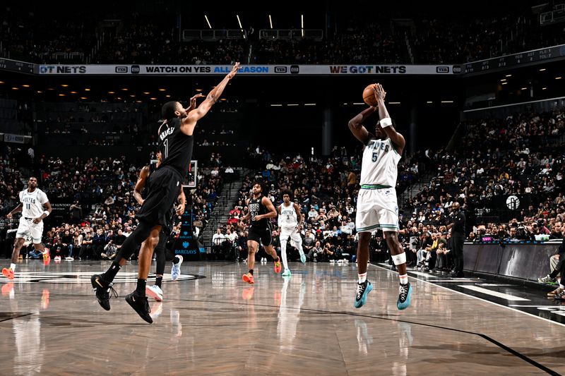 BROOKLYN, NY - JANUARY 25: Anthony Edwards #5 of the Minnesota Timberwolves shoots a three point basket against the Brooklyn Nets on January 25, 2024 at Barclays Center in Brooklyn, New York. NOTE TO USER: User expressly acknowledges and agrees that, by downloading and or using this Photograph, user is consenting to the terms and conditions of the Getty Images License Agreement. Mandatory Copyright Notice: Copyright 2024 NBAE (Photo by David Dow/NBAE via Getty Images)