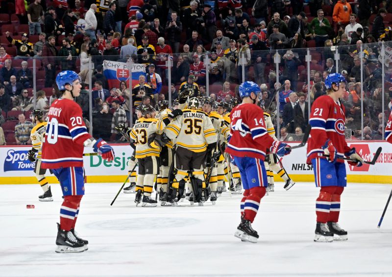 Mar 14, 2024; Montreal, Quebec, CAN; Boston Bruins goalie Linus Ullmark (35) celebrates with teammates the win against the Montreal Canadiens in overtime at the Bell Centre. Mandatory Credit: Eric Bolte-USA TODAY Sports