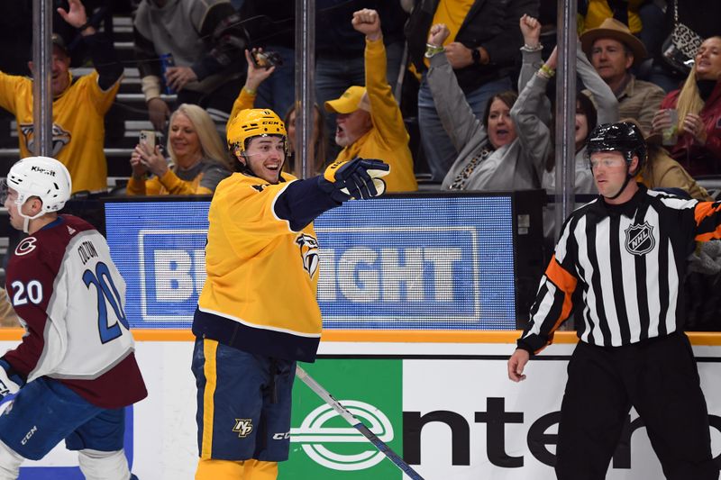 Mar 2, 2024; Nashville, Tennessee, USA; Nashville Predators center Cody Glass (8) celebrates after a goal during the first period against the Colorado Avalanche at Bridgestone Arena. Mandatory Credit: Christopher Hanewinckel-USA TODAY Sports