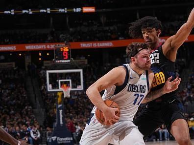 DENVER, CO - DECEMBER 18: Luka Doncic #77 of the Dallas Mavericks handles the ball during the game against the Denver Nuggets on December 18, 2023 at the Ball Arena in Denver, Colorado. NOTE TO USER: User expressly acknowledges and agrees that, by downloading and/or using this Photograph, user is consenting to the terms and conditions of the Getty Images License Agreement. Mandatory Copyright Notice: Copyright 2023 NBAE (Photo by Bart Young/NBAE via Getty Images)