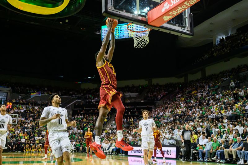Mar 1, 2025; Eugene, Oregon, USA; USC Trojans forward Rashaun Agee (12) prepares to dunk the ball against the Oregon Ducks during the second half at Matthew Knight Arena. Mandatory Credit: Craig Strobeck-Imagn Images