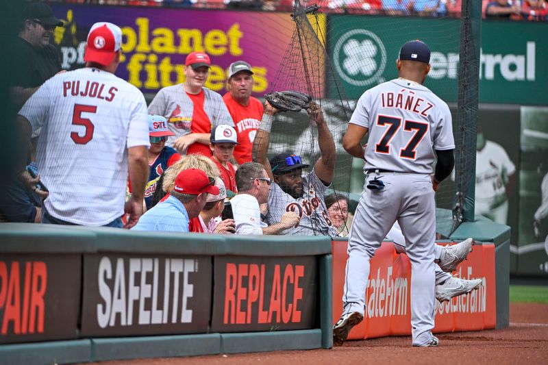 May 6, 2023; St. Louis, Missouri, USA;  Detroit Tigers left fielder Akil Baddoo (60) falls in to the netting and is unable to catch a foul ball hit by St. Louis Cardinals right fielder Lars Nootbaar (not pictured) during the seventh inning at Busch Stadium. Mandatory Credit: Jeff Curry-USA TODAY Sports