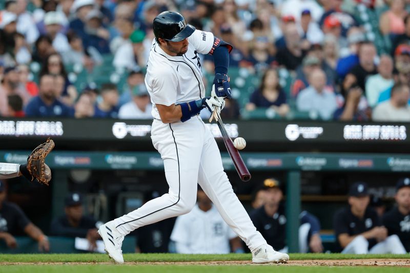 Jun 24, 2024; Detroit, Michigan, USA;  Detroit Tigers third baseman Matt Vierling (8) breaks his bat as he hits into a triple play in the third inning against the Philadelphia Phillies at Comerica Park. Mandatory Credit: Rick Osentoski-USA TODAY Sports