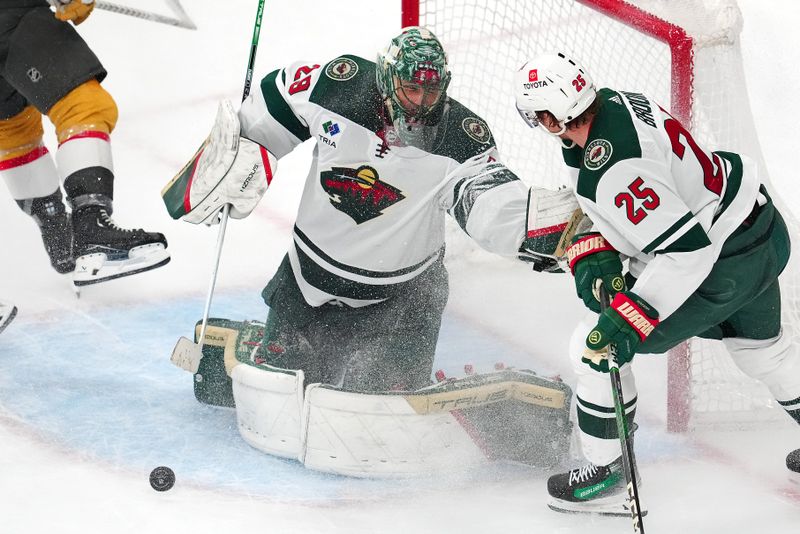 Apr 12, 2024; Las Vegas, Nevada, USA; Minnesota Wild goaltender Marc-Andre Fleury (29) makes a save against the Vegas Golden Knights during the third period at T-Mobile Arena. Mandatory Credit: Stephen R. Sylvanie-USA TODAY Sports