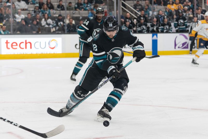 Feb 24, 2024; San Jose, California, USA; San Jose Sharks center Ryan Carpenter (22) controls the puck during the first period against the Nashville Predators at SAP Center at San Jose. Mandatory Credit: Stan Szeto-USA TODAY Sports