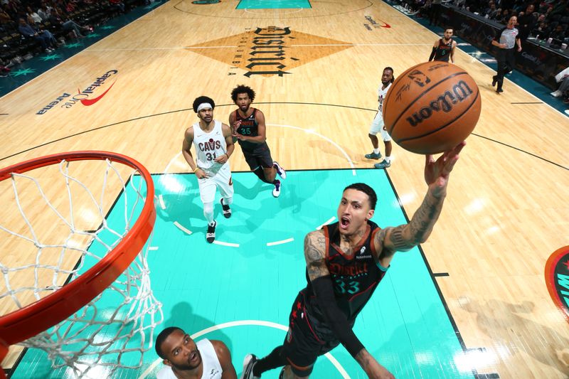 WASHINGTON, DC -? FEBRUARY 25: Kyle Kuzma #33 of the Washington Wizards drives to the basket during the game against the Cleveland Cavaliers on February 25, 2024 at Capital One Arena in Washington, DC. NOTE TO USER: User expressly acknowledges and agrees that, by downloading and or using this Photograph, user is consenting to the terms and conditions of the Getty Images License Agreement. Mandatory Copyright Notice: Copyright 2024 NBAE (Photo by Stephen Gosling/NBAE via Getty Images)