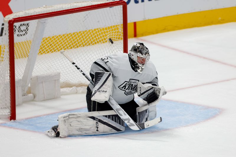 Mar 16, 2024; Dallas, Texas, USA; A puck gets past Los Angeles Kings goaltender David Rittich (31) during the first period against the Dallas Stars at American Airlines Center. Mandatory Credit: Andrew Dieb-USA TODAY Sports