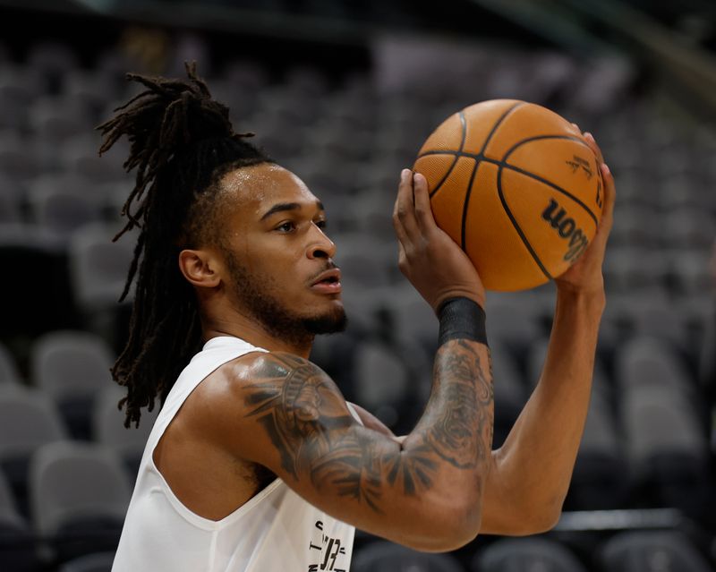 SAN ANTONIO, TX - DECEMBER 5: Stephon Castle #5 of the San Antonio Spurs takes warm up shots before the start of their game against the Chicago Bulls at Frost Bank Center on December 5, 2024 in San Antonio, Texas. NOTE TO USER: User expressly acknowledges and agrees that, by downloading and or using this photograph, User is consenting to terms and conditions of the Getty Images License Agreement. (Photo by Ronald Cortes/Getty Images)