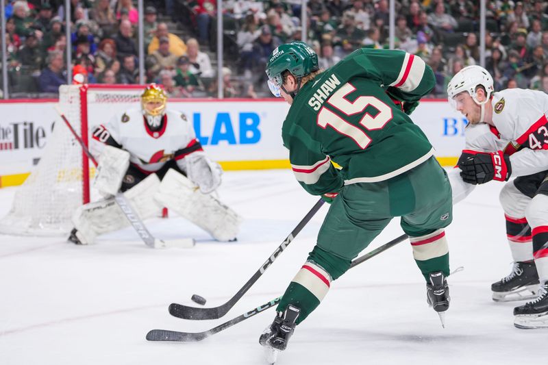 Apr 2, 2024; Saint Paul, Minnesota, USA; Minnesota Wild center Mason Shaw (15) shoots against the Ottawa Senators goaltender Joonas Korpisalo (70) in the second period at Xcel Energy Center. Mandatory Credit: Brad Rempel-USA TODAY Sports