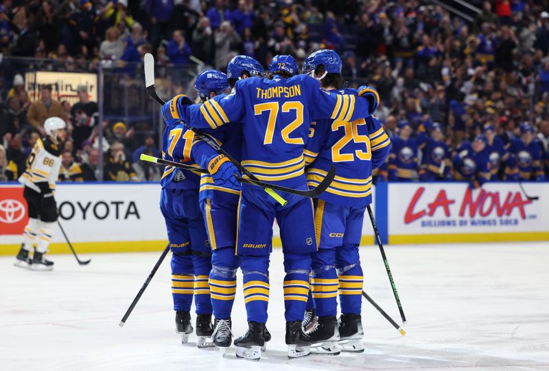 Jan 28, 2025; Buffalo, New York, USA;  Buffalo Sabres center Tage Thompson (72) celebrates his goal with teammates during the second period against the Boston Bruins at KeyBank Center. Mandatory Credit: Timothy T. Ludwig-Imagn Images