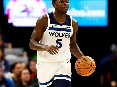 MINNEAPOLIS, MINNESOTA - NOVEMBER 01: Anthony Edwards #5 of the Minnesota Timberwolves dribbles the ball against the Denver Nuggets in the second quarter at Target Center on November 01, 2023 in Minneapolis, Minnesota. The Timberwolves defeated the Nuggets 110-89. NOTE TO USER: User expressly acknowledges and agrees that, by downloading and or using this photograph, User is consenting to the terms and conditions of the Getty Images License Agreement. (Photo by David Berding/Getty Images)