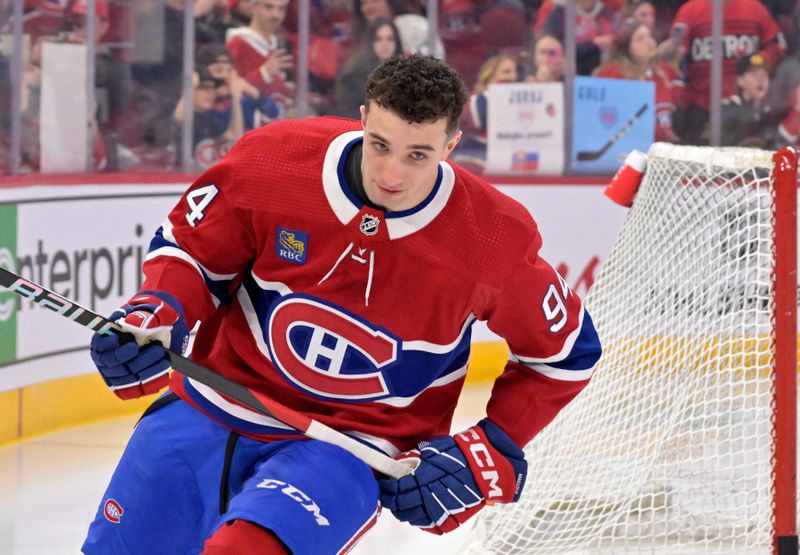 Apr 16, 2024; Montreal, Quebec, CAN; Montreal Canadiens defenseman Logan Mailloux (94) skates on his solo lap during the warmup period before the game against the Detroit Red Wings at the Bell Centre. Mandatory Credit: Eric Bolte-USA TODAY Sports