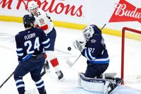 Florida Panthers Claw at Jets, But Winnipeg Soars in Goal Fest