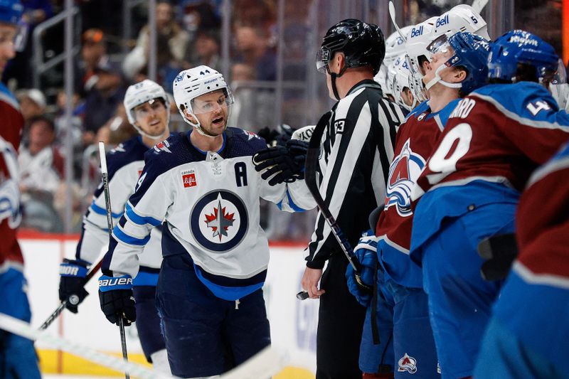 Apr 26, 2024; Denver, Colorado, USA; Winnipeg Jets defenseman Josh Morrissey (44) celebrates with the bench after his goal in the second period against the Colorado Avalanche in game three of the first round of the 2024 Stanley Cup Playoffs at Ball Arena. Mandatory Credit: Isaiah J. Downing-USA TODAY Sports