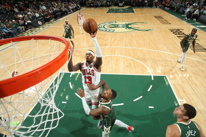 MILWAUKEE, WI - NOVEMBER 20: Torrey Craig #13 of Chicago Bulls shoots the ball during the game against the Milwaukee Bucks on November 20, 2024 at the Fiserv Forum Center in Milwaukee, Wisconsin. NOTE TO USER: User expressly acknowledges and agrees that, by downloading and or using this Photograph, user is consenting to the terms and conditions of the Getty Images License Agreement. Mandatory Copyright Notice: Copyright 2024 NBAE (Photo by Gary Dineen/NBAE via Getty Images).