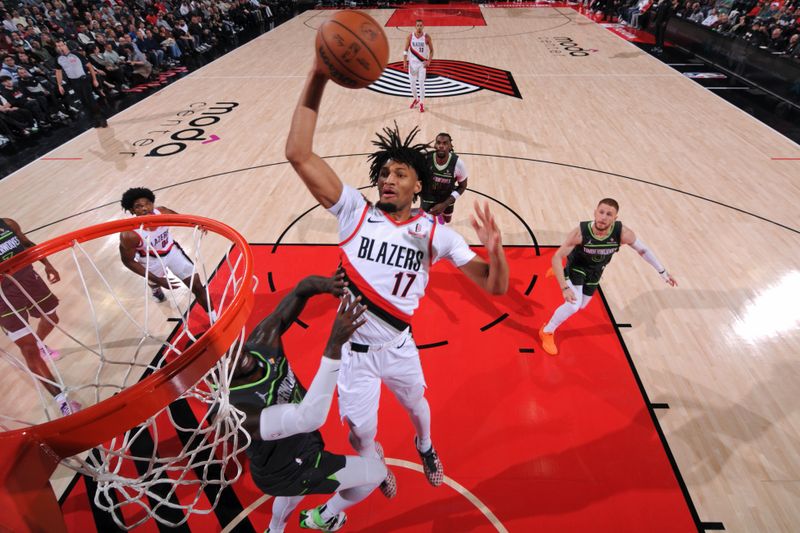 PORTLAND, OR - NOVEMBER 13: Shaedon Sharpe #17 of the Portland Trail Blazers dunks the ball during the game against the Minnesota Timberwolves on November 13, 2024 at the Moda Center Arena in Portland, Oregon. NOTE TO USER: User expressly acknowledges and agrees that, by downloading and or using this photograph, user is consenting to the terms and conditions of the Getty Images License Agreement. Mandatory Copyright Notice: Copyright 2024 NBAE (Photo by Cameron Browne/NBAE via Getty Images)