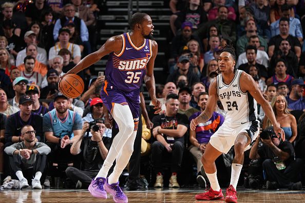 PHOENIX, AZ - NOVEMBER 2: Kevin Durant #35 of the Phoenix Suns dribbles the ball during the game against the San Antonio Spurs on November 2, 2023 at Footprint Center in Phoenix, Arizona. NOTE TO USER: User expressly acknowledges and agrees that, by downloading and or using this photograph, user is consenting to the terms and conditions of the Getty Images License Agreement. Mandatory Copyright Notice: Copyright 2023 NBAE (Photo by Garrett Ellwood/NBAE via Getty Images)