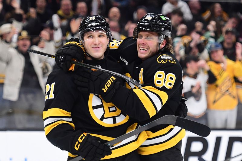 Dec 23, 2025; Boston, Massachusetts, USA; Boston Bruins right wing David Pastrnak (88) celebrates a goal by center Alex Steeves (21) against the Montreal Canadians during the first period at TD Garden. Mandatory Credit: Bob DeChiara-Imagn Images