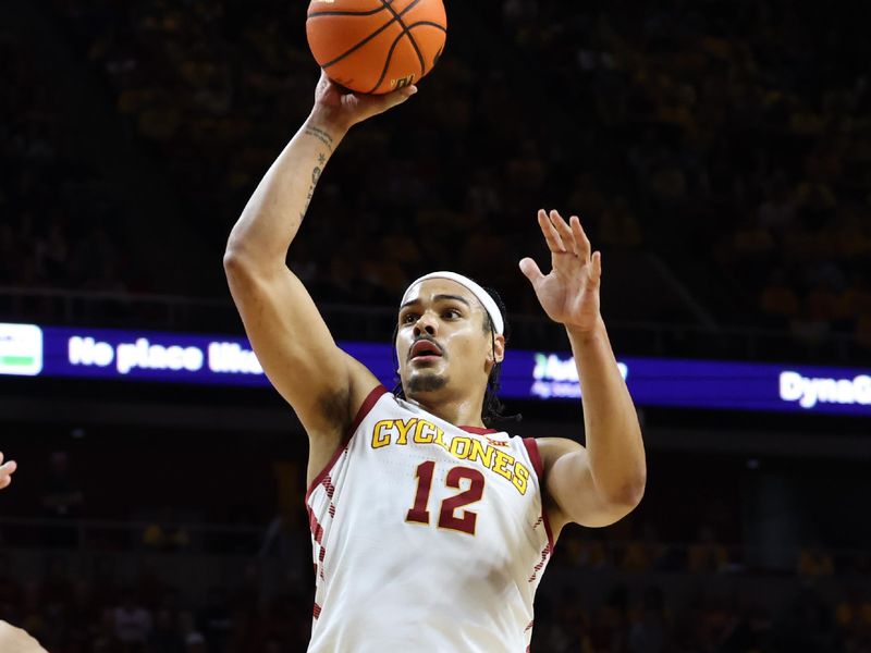 Mar 6, 2024; Ames, Iowa, USA; Iowa State Cyclones forward Robert Jones (12) shoots against the Iowa State Cyclones at James H. Hilton Coliseum. Mandatory Credit: Reese Strickland-USA TODAY Sports

