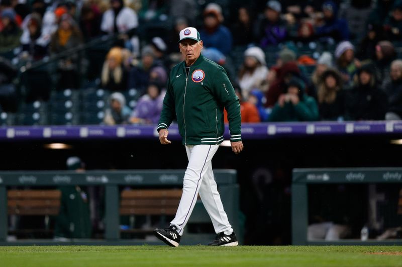 Apr 20, 2024; Denver, Colorado, USA; Colorado Rockies manager Bud Black (10) walks to the mound in the fifth inning against the Seattle Mariners at Coors Field. Mandatory Credit: Isaiah J. Downing-USA TODAY Sports