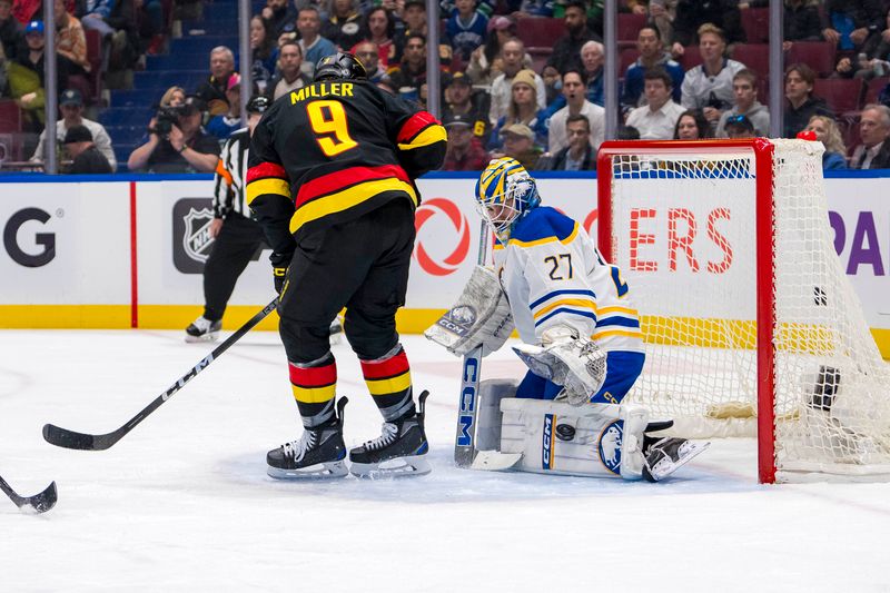 Mar 19, 2024; Vancouver, British Columbia, CAN; Buffalo Sabres goalie Devon Levi (27) makes a save as Vancouver Canucks forward J.T. Miller (9) looks for the rebound in the first period at Rogers Arena. Mandatory Credit: Bob Frid-USA TODAY Sports