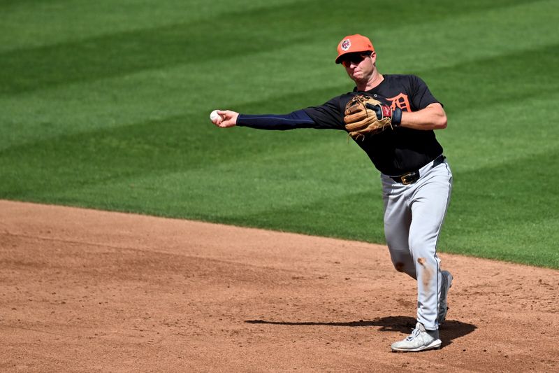 Mar 5, 2024; North Port, Florida, USA;  Detroit Tigers second baseman Colt Keith (33) throws to first base in the third inning of the spring training game against the Atlanta Braves at CoolToday Park. Mandatory Credit: Jonathan Dyer-USA TODAY Sports